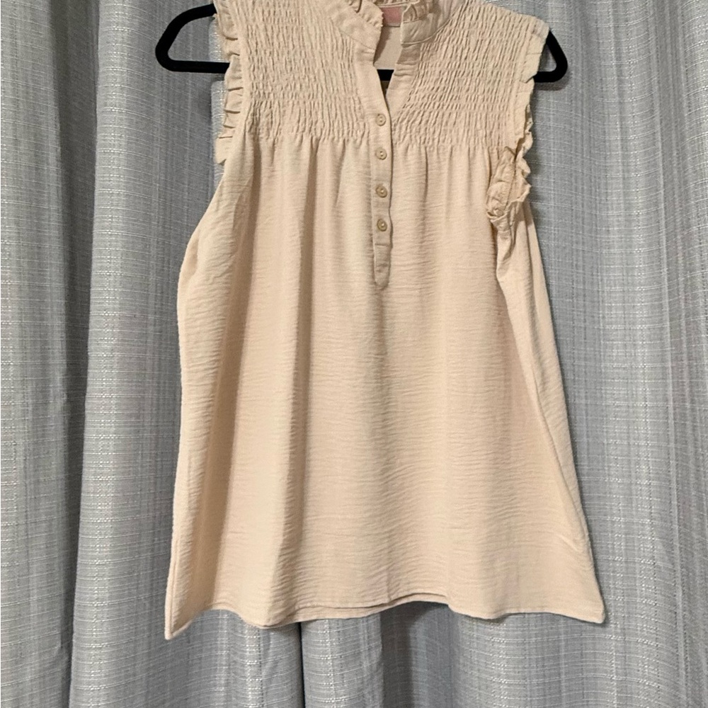 Chic Sleeveless Blouse with Ruffle Accents